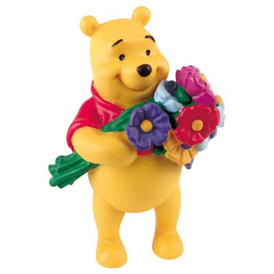 Figurine de Winnie l'ourson avec des fleurs