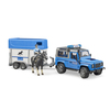 Véhicule Land Rover Police avec remorque cheval et policier