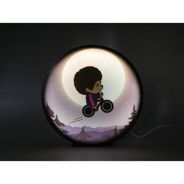 Décoration lumineuse Monchichi à vélo