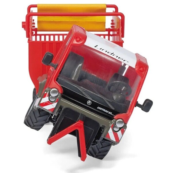 Lindner Unitrac avec wagon de chargement