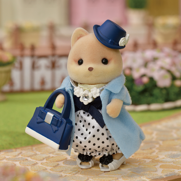 Sylvanian Families - 5541 - Grande sœur chien caramel et sa valisette de mode