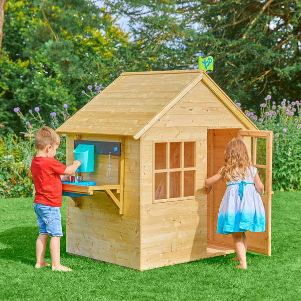 Maison en bois avec cuisine extérieure