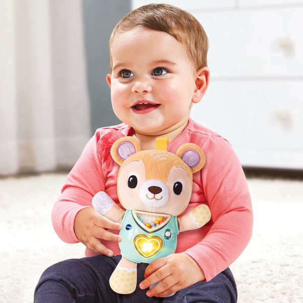 Peluche musicale Lumi chant ourson 